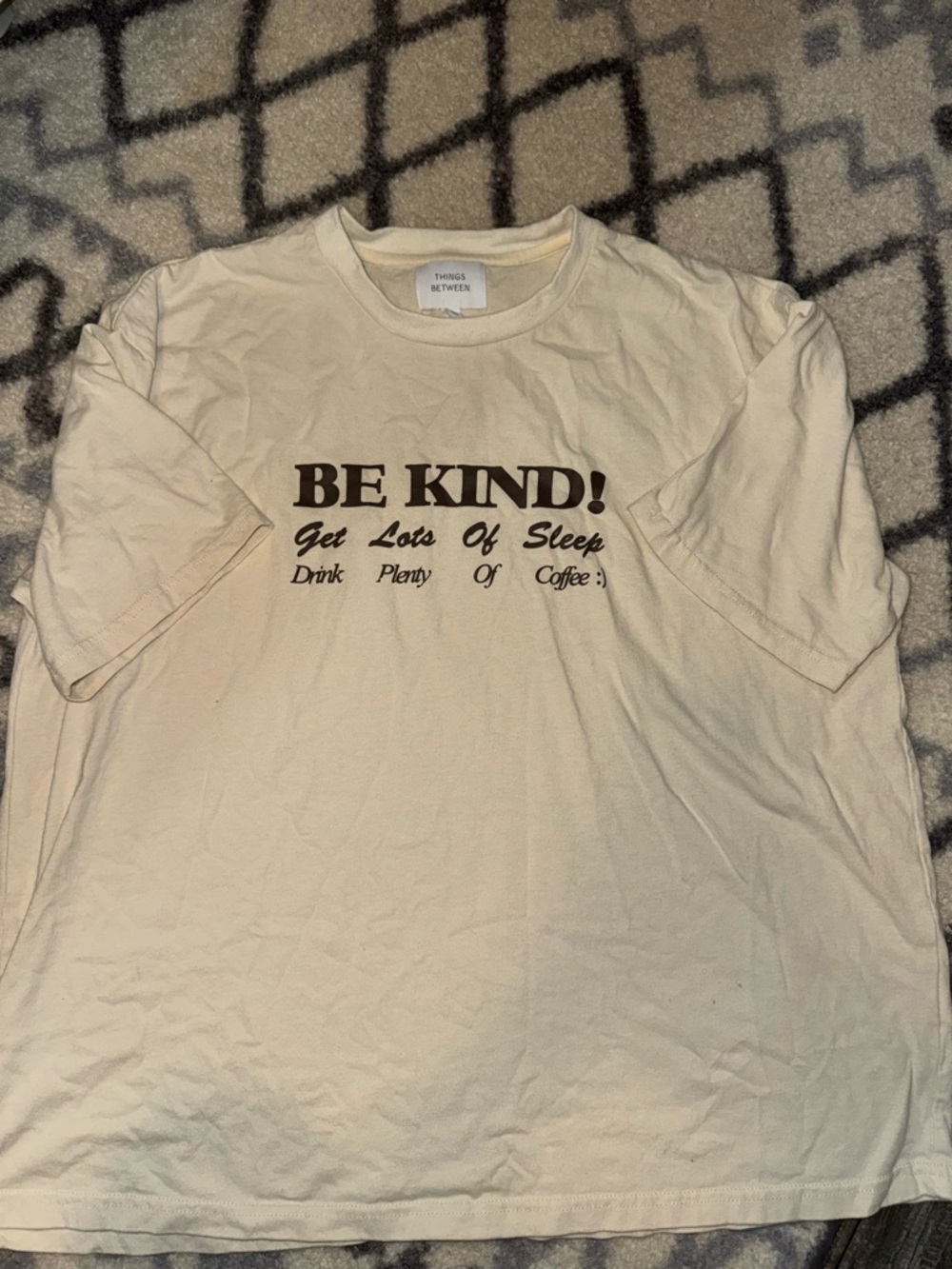 Be Kind! Graphic Tee in Cream with Brown Text